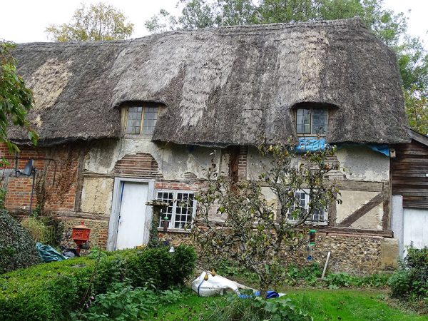 Timber 17thC frame cottage before repair in progress