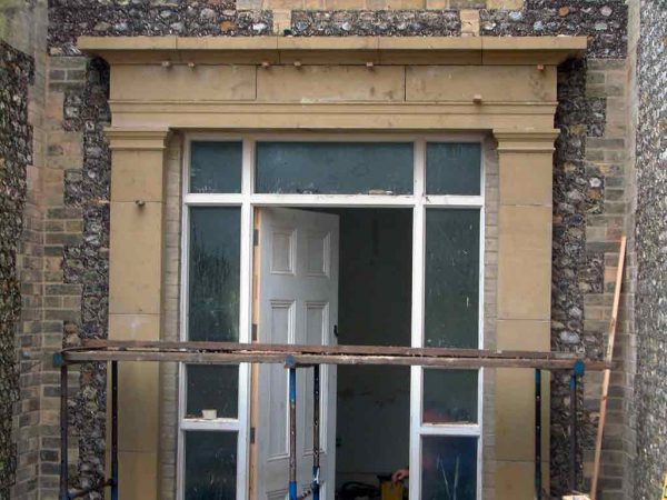 Buff brick galletted flint