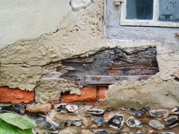 Timber frame cottage before repair