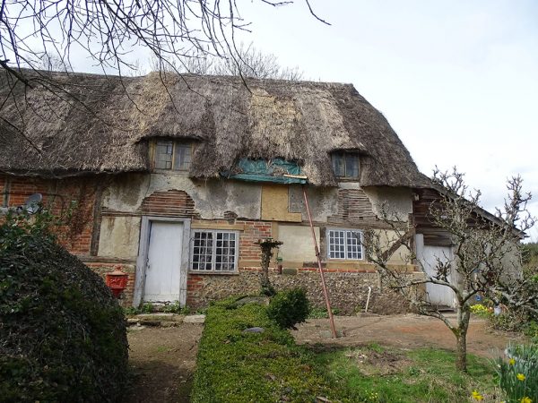 Timber 17thC frame cottage before repair complete