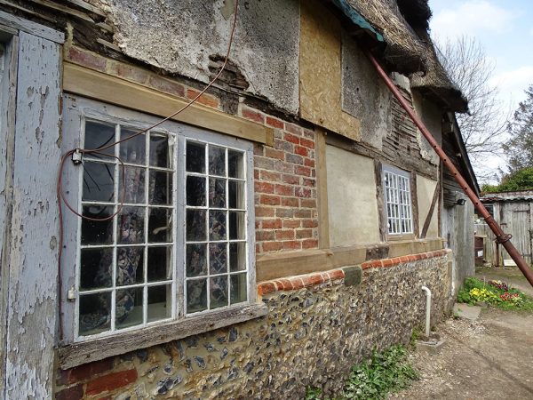 Timber 17thC frame cottage before repair complete